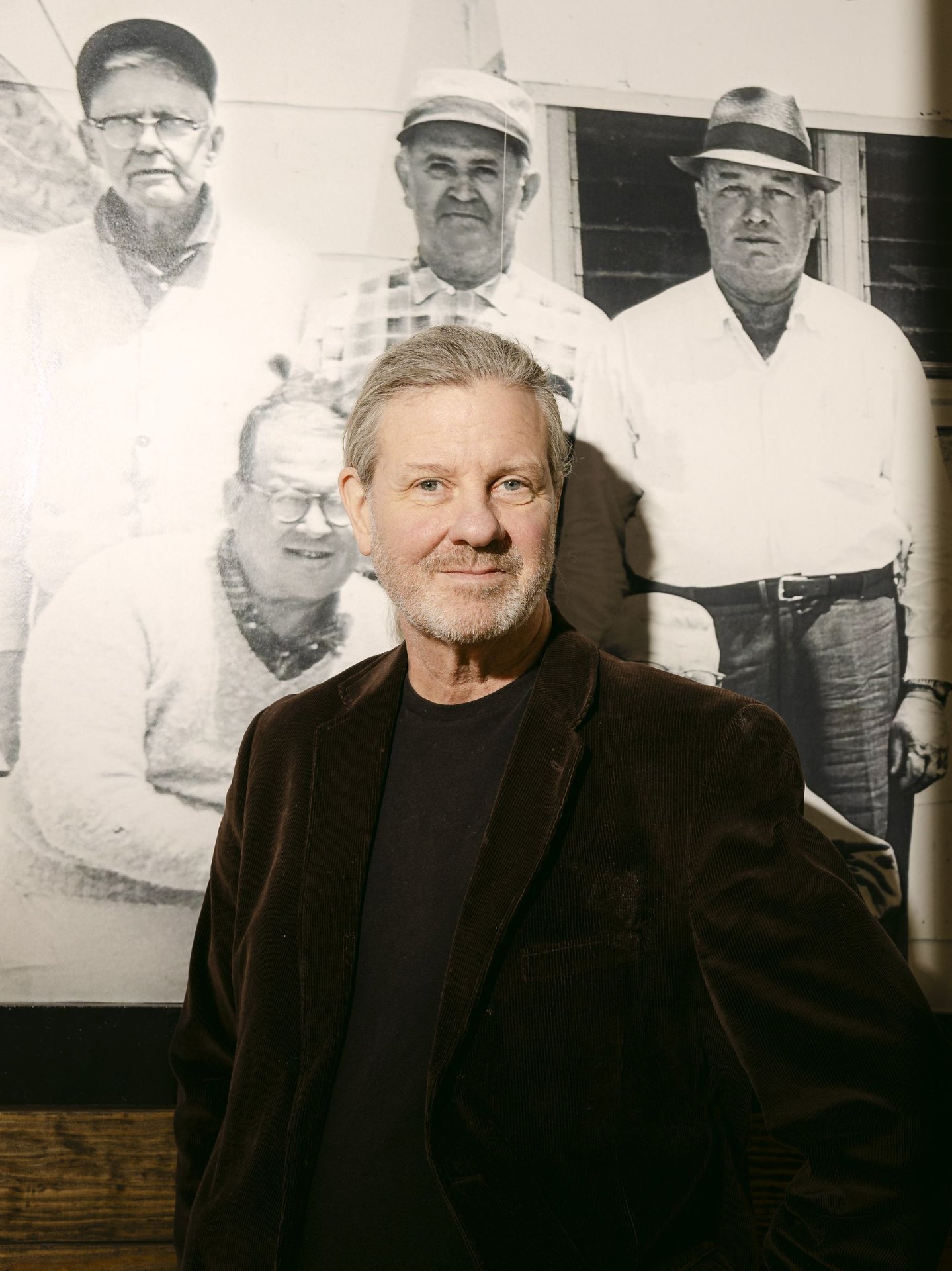 Founder portrait with archival photo